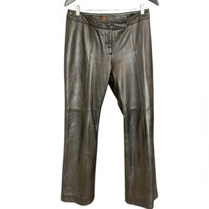 Danier size 8 Black Leather Pants in good condition- minor wear throughout.